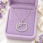 Dije Gatita con Moño de Plata .925 con Cadena Incluida