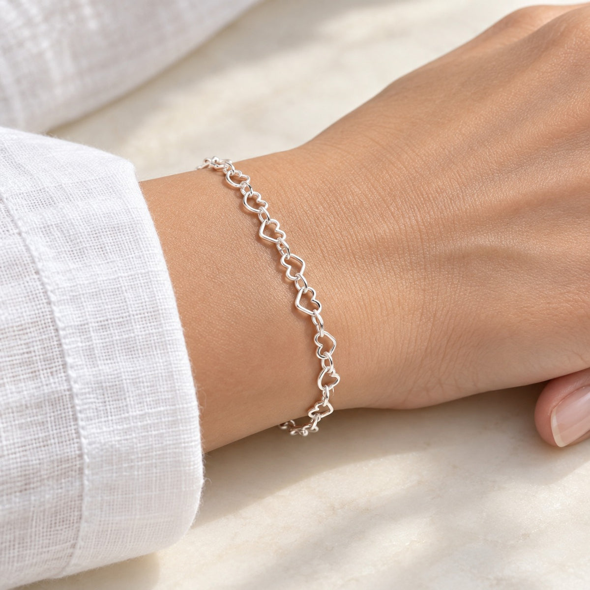 Pulsera Corazones Entrelazados de Plata .925 – 21 cm