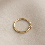 Piercing para nariz de oro 10K tipo aro liso con detalle de balín
