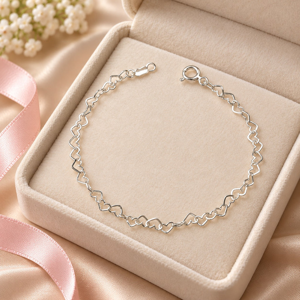 Pulsera Corazones Entrelazados de Plata .925 – 21 cm